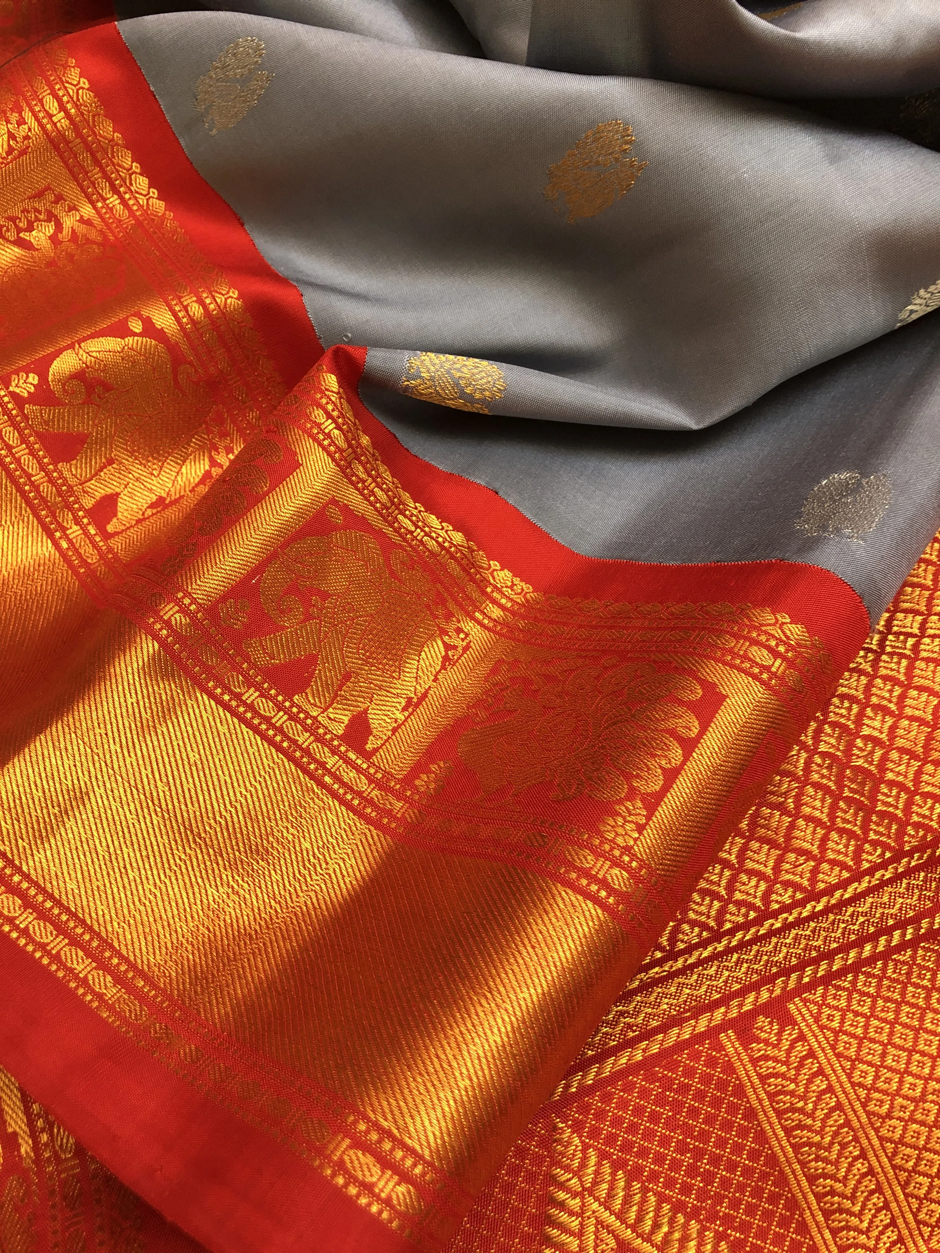 Ash Color Pure gadwal Silk Saree with Silver & Golden Zari Motif Work